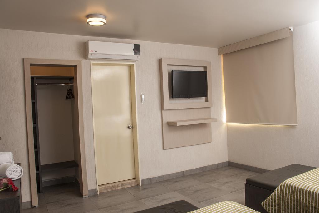 Hotel Expo Abastos Гуадалахара Стая снимка